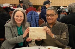 Ogichidaa Francis Kavanaugh of Grand Council Treaty #3 is presented with “The sacred scrolls of the southern Ojibway” by Karen Drake, Counsel at JFK Law LLP and member of the Wabigoon Lake Ojibway Nation.