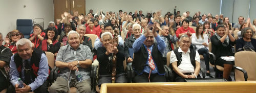 Gitxaała hereditary leaders and members celebrate at the Federal Court of Appeal after their arguments are heard against the Northern Gateway Project.
